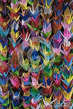 Bunches of colorful Origami paper crane birds full frame Stock Photo