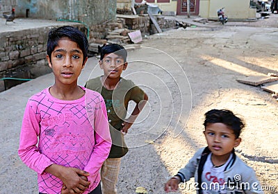 Young children playing in the street Editorial Stock Photo