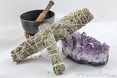 Bundles of Sage with a beautiful Amethyst Crystal and singing bowl Stock Photo