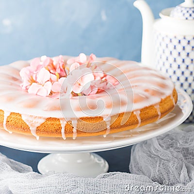 Bundt cake with frosting. Festive treat spring flowers Stock Photo