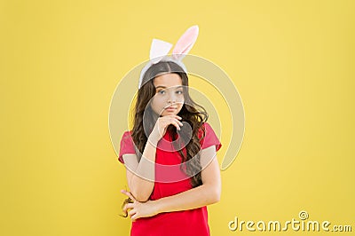 Bunny child. Girl child wear rabbit ears. Join my party. Spring season. Holiday celebration. Charismatic baby Stock Photo