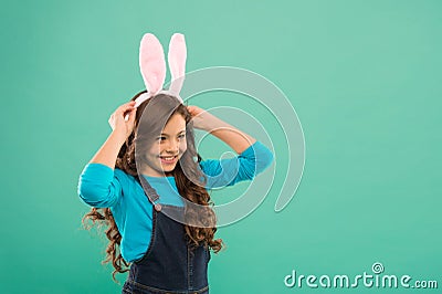 Bunny kisses, Easter wishes. Happy bunny rabbit. Small child wear bunny ears. Beauty look of cute bunny. Little girl Stock Photo