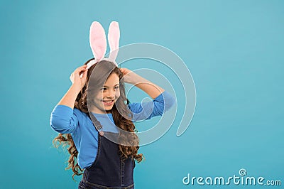 Bunny kisses, Easter wishes. Happy bunny rabbit. Small child wear bunny ears. Beauty look of cute bunny. Little girl Stock Photo