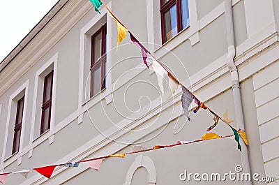 A bunting of colorful burgees flittering in the wind Stock Photo