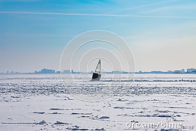 A Buoy in a Frozen Lake Michigan in Chicago after a Polar Vortex Stock Photo