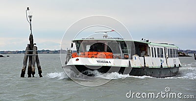 Ship for passenger transport called VAPORETTO Editorial Stock Photo