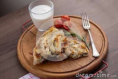 Burek or bourek pie with cheese and spinach Stock Photo