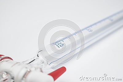 Burette on white Stock Photo