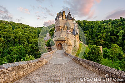 Burg Eltz castle in Rhineland-Palatinate at sunset Editorial Stock Photo