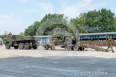 German military forklift FUG 2, 5 on a trailer at open day in barrack burg Editorial Stock Photo