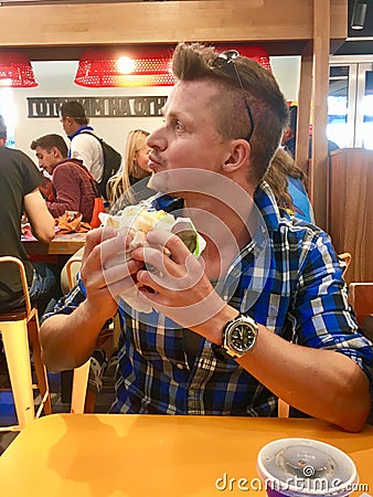 Burger King visitor eating Editorial Stock Photo