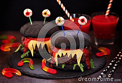 Burgers monsters for Halloween celebration. Stock Photo