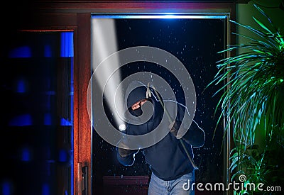 Night burglar just broke into a home Stock Photo