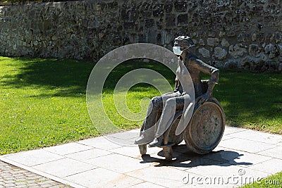 BURGOS, SPAIN - AUGUST 05th - 2020: work which pays tribute to people with a disability wearing a mask in Burgos Spain Editorial Stock Photo