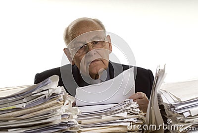 Buried in papers Stock Photo