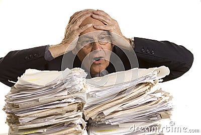 Buried in papers Stock Photo