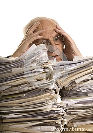 Buried in papers Stock Photo