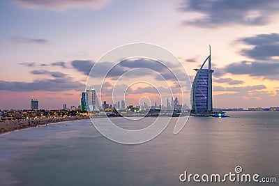 Burj Al Arab and Jumeirah Beach Hotel at the sunset Editorial Stock Photo