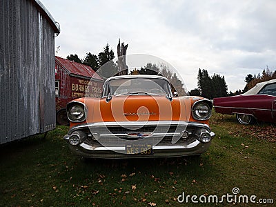 Burkes Pass, New Zealand - 2023: Old vintage retro orange Chevrolet classic car in Burkes Pass Village outdoor museum Editorial Stock Photo