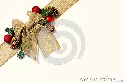 Burlap Christmas Bow, and Ornaments with Pinecones Isolated on W Stock Photo