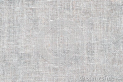 Burlap texture, canvas cloth, light gray woven rustic bagging. Natural hessian jute, textile texture. White linen fabric pattern. Stock Photo