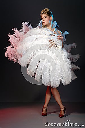 Burlesque artist with ostrich feather fan Stock Photo