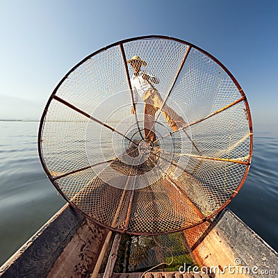 Burma Myanmar Inle lake fisherman on boat catching fish Stock Photo