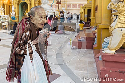 Burmese elderly women praying Buddha Editorial Stock Photo