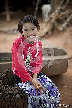 Burmese girl with danaka paste on face Editorial Stock Photo