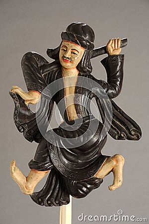 Burmese statue of a magician Stock Photo