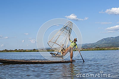 Burmese traditional fisherman. Editorial Stock Photo