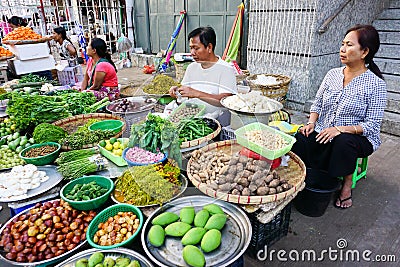 Burmese women selling fresh fruits at Bogyoke market Editorial Stock Photo