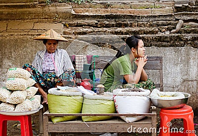 Burmese women selling street foods in Mandalay, Myanmar Editorial Stock Photo