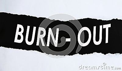 BURN-OT - word in white letters on black paper with a torn strip Stock Photo