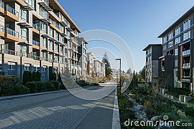 BURNABY, CANADA - NOVEMBER 17, 2019: apartment buildings and street view on sunny autumn day in British Columbia Editorial Stock Photo