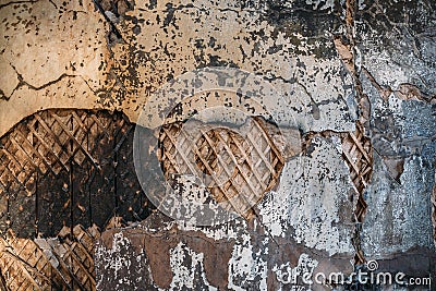 Burned and damaged old dirty grungy wood and cement wall texture surface of ruined house Stock Photo