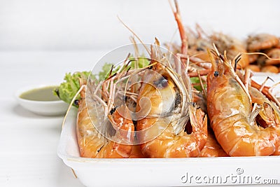 Burned shrimp Or Grilled shrimp and seafood . Stock Photo