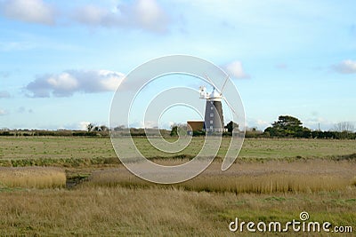 Windmill over the reed beds. Stock Photo