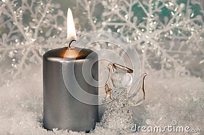 Burning candle and angel Stock Photo