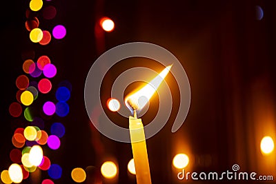 Burning candle on diwali night. Stock Photo