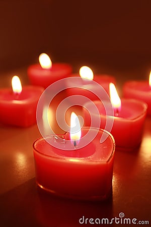 Burning candle hearts Stock Photo