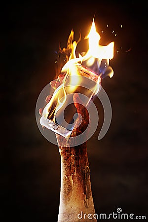 Burning cell phone Stock Photo