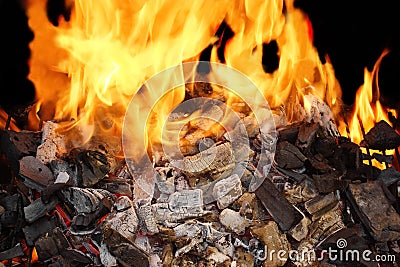 Burning Charcoal and a Bright Flame Stock Photo