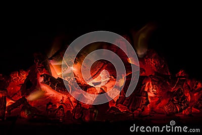 Burning coals with fire flames Stock Photo