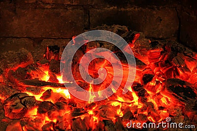 Burning coals in the fireplace Stock Photo