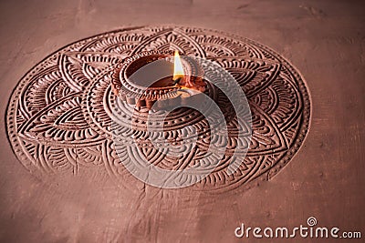 Burning diya on Happy Diwali, background for light festival of India Stock Photo