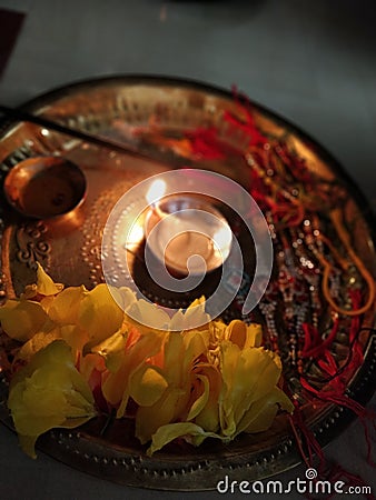 Burning diya for worship on rakhi festival Stock Photo