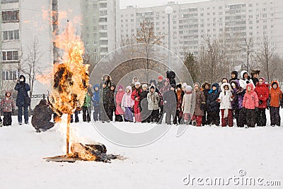 Burning effigy Maslency. Winter snow. We are seeing winter Editorial Stock Photo