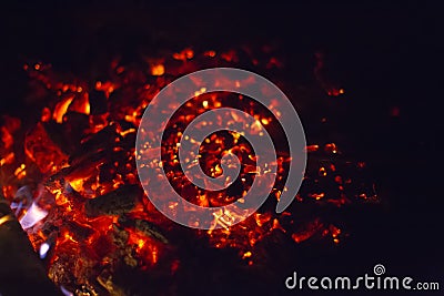 Burning embers of a fire Stock Photo