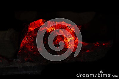 Burning Embers in a Country Wood Stove Stock Photo